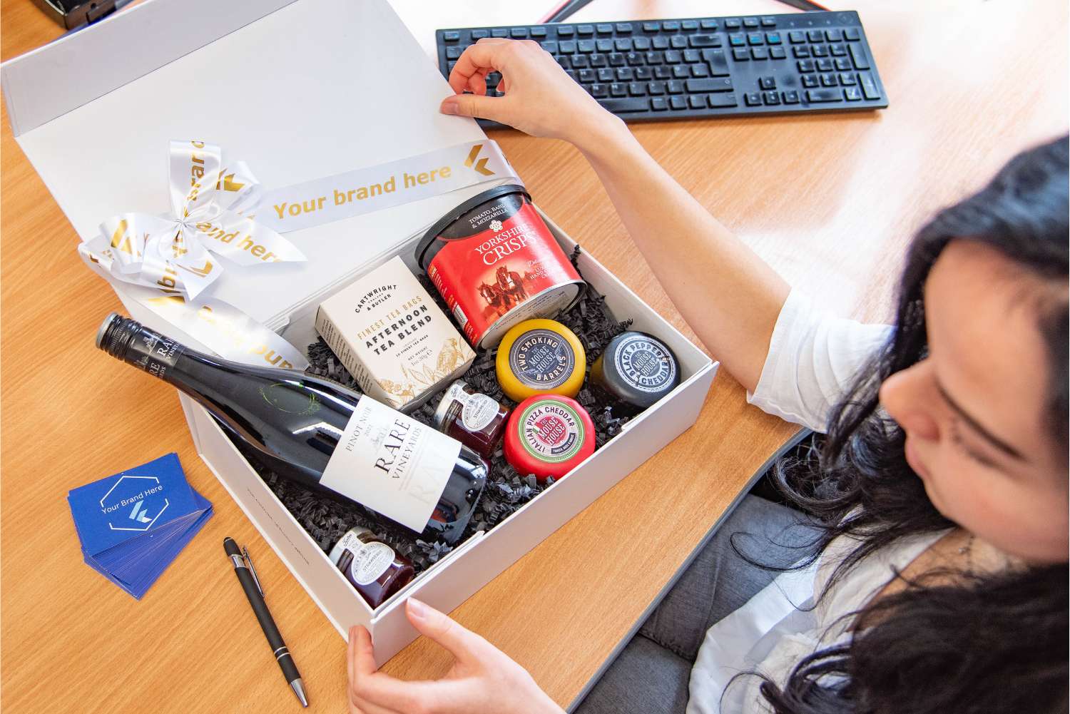 Open company hamper on table